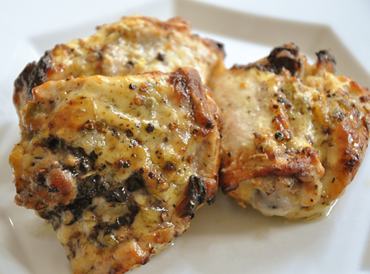 cooked yogurt marinated chicken thighs on a plate