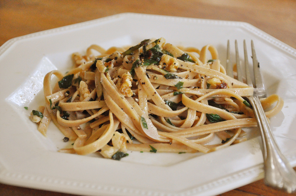 A plate of herbed garlic and walnut pasta