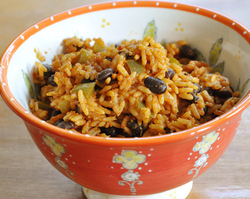 The perfect side dish for Mexican night is this recipe for Mexican rice loaded with black beans, green peppers and spices. | livinglou.com