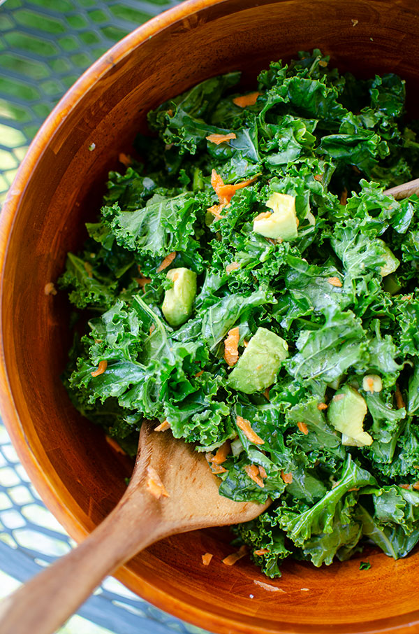 Closeup of salad in a wooden bowl.