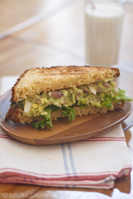 Bacon and avocado egg salad sandwich with lettuce