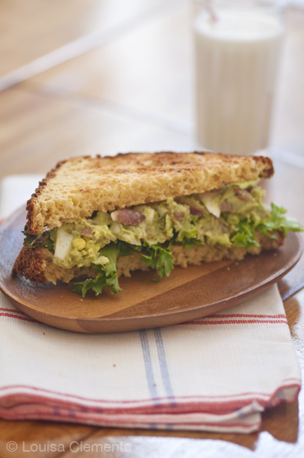 Bacon and avocado egg salad sandwich with lettuce