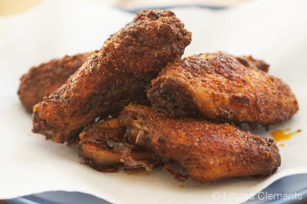 Make crispy baked chicken wings at home in the oven using cornstarch. | livinglou.com