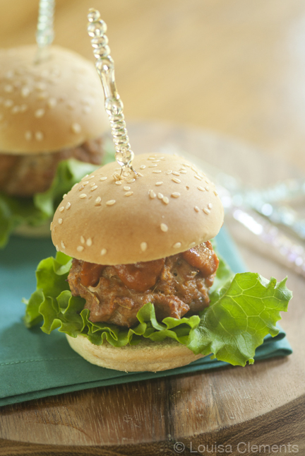 barbecue turkey meatball sliders with lettuce on a plate