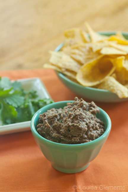 black bean dip in a bowl with corn chips