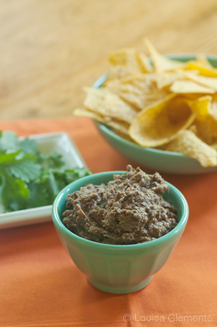 black bean dip in a bowl with corn chips