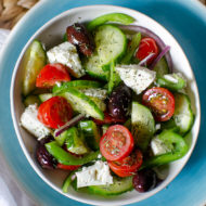 A serving bowl of Greek salad