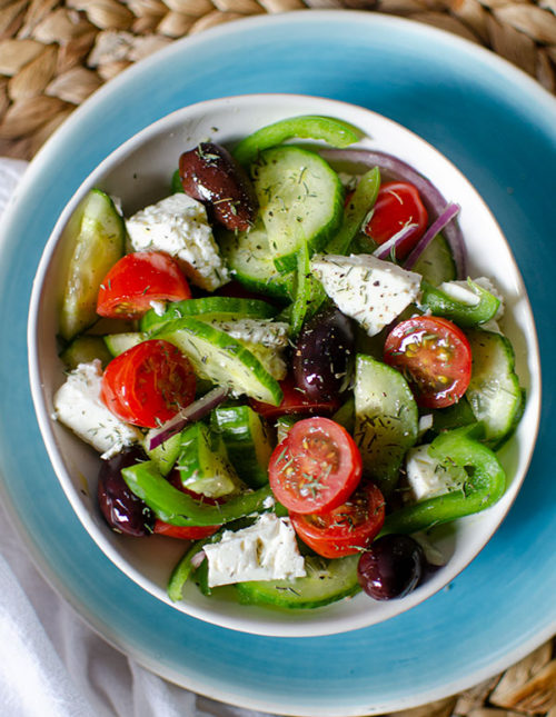 A serving bowl of Greek salad