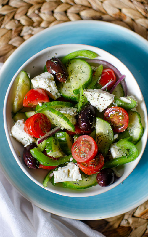 A serving bowl of Greek salad