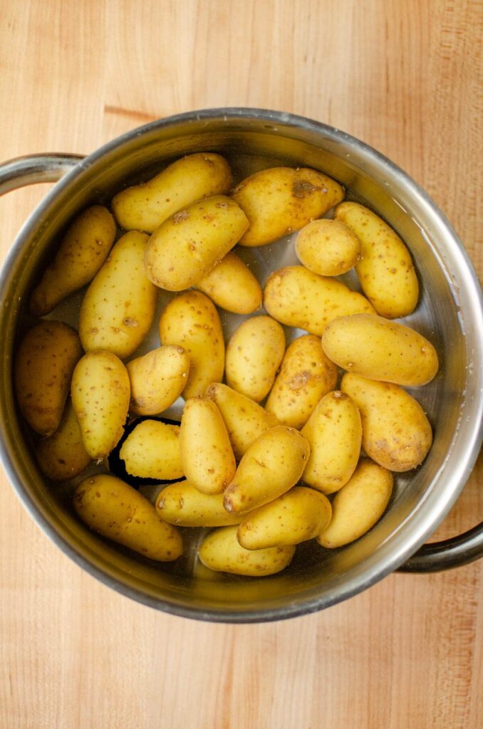 Potatoes in a pot with water.