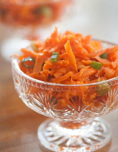 Carrot ginger slaw in a glass dish