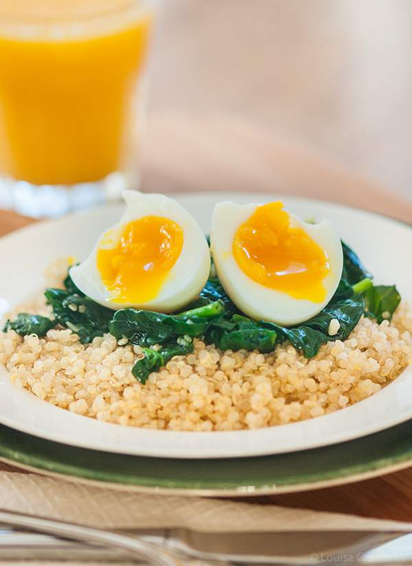 Start your morning off on the right foot with this protein packed, savoury breakfast of a soft boiled egg over quinoa and spinach. | livinglou.com