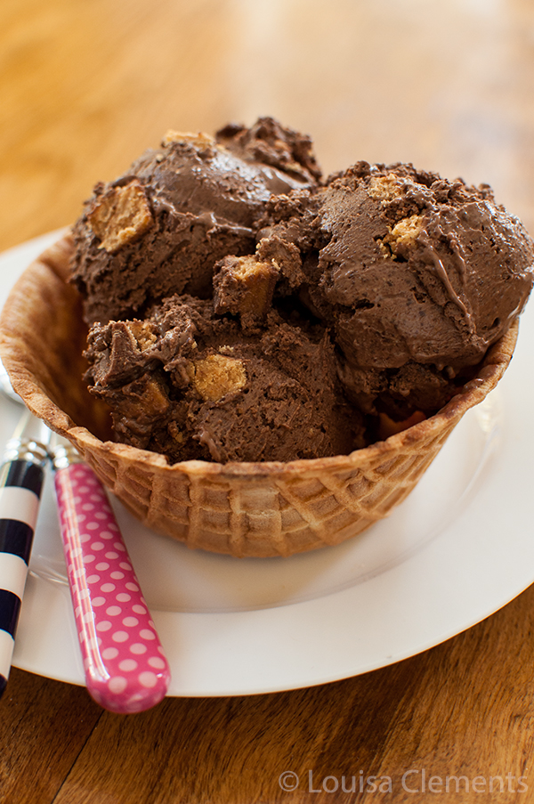 Chocolate peanut butter ice cream in a waffle cone bowl