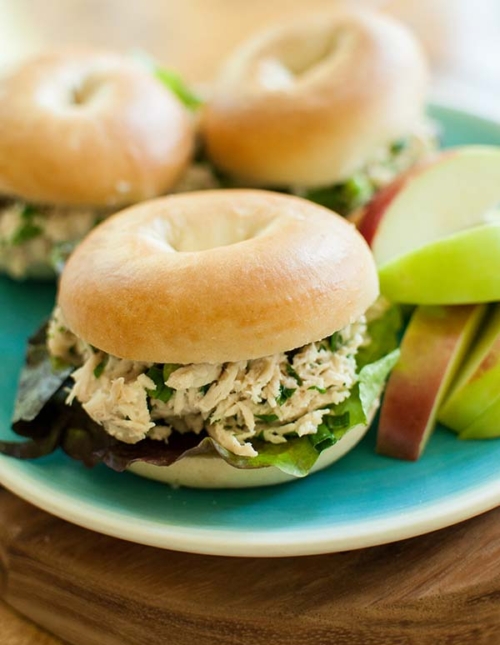 Let your slow cooker do all the work with this recipe for homemade slow cooker chicken caesar salad sandwiches.