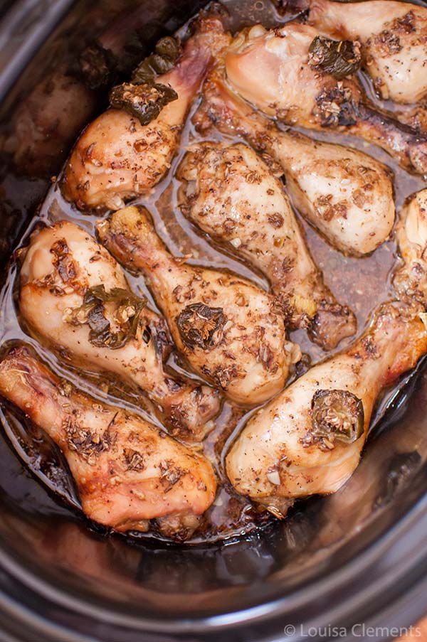 Just throw everything in the slow cooker and come home to a delicious dinner of slow cooker balsamic jalapeno chicken legs. | livinglou.com