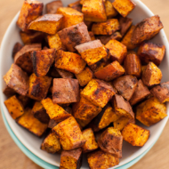 cinnamon chili roasted sweet potatoes in a bowl