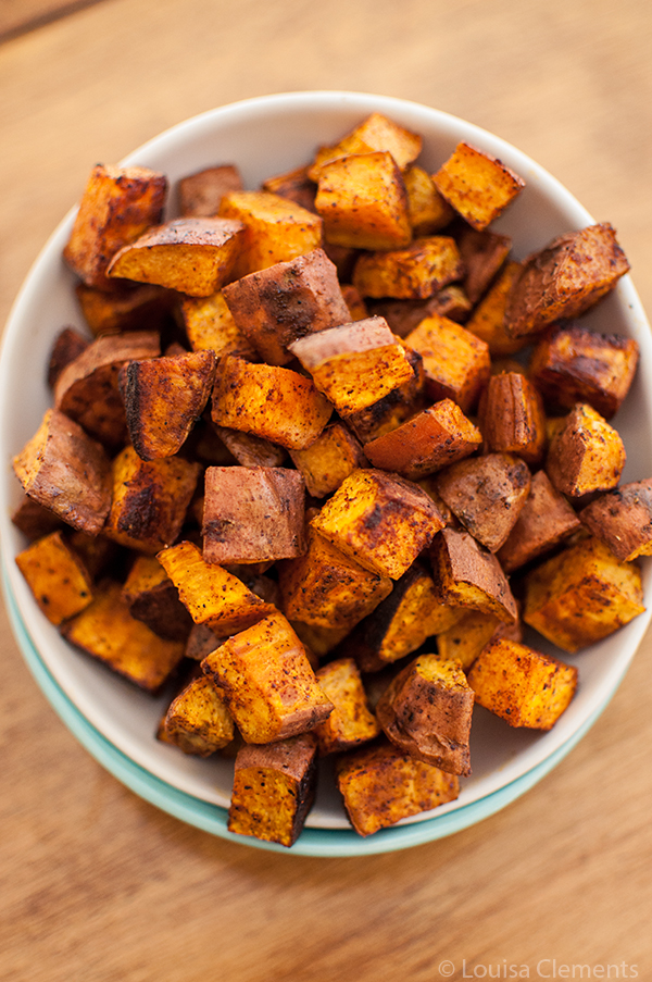 cinnamon chili roasted sweet potatoes in a bowl