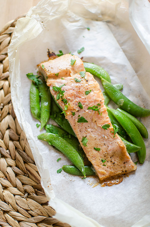 Finished miso salmon on top of sugar snap peas on parchment paper.