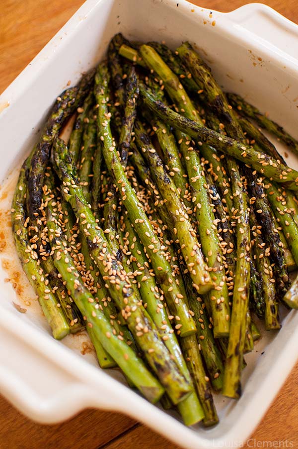 Grilled asparagus is a delicious side dish. Add some Asian flavour by tossing with a simple sesame dressing. | livinglou.com