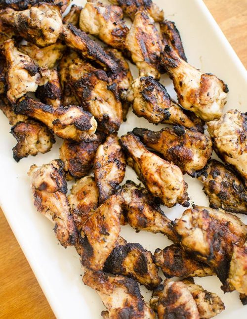 A platter of grilled Greek chicken wings