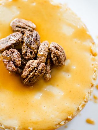 A recipe for caramel apple cheesecake that uses cinnamon and an apple caramel sauce to bring your favourite fall flavours into a decadent and rich dessert. #whatscooking | livinglou.com