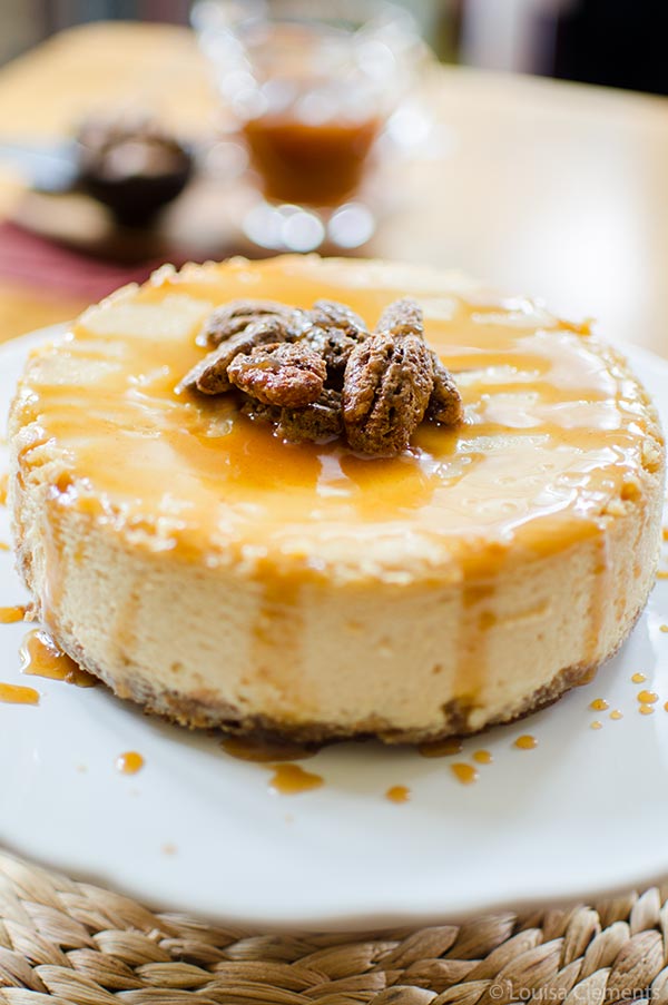 A recipe for caramel apple cheesecake that uses cinnamon and an apple caramel sauce to bring your favourite fall flavours into a decadent and rich dessert. #whatscooking | livinglou.com