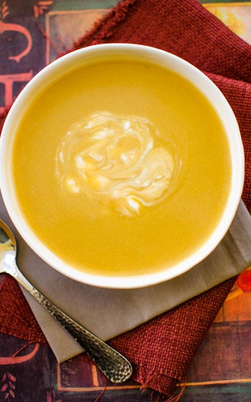 With aromatic fall spices like nutmeg and cinnamon, this creamy and spiced acorn squash soup is light and perfect for cool fall days. | livinglou.com