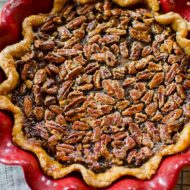 Combine everyone's two favourite pies for a decadent pumpkin pecan pie. The bottom layer is pumpkin and the top layer, a gooey pecan. | livinglou.com