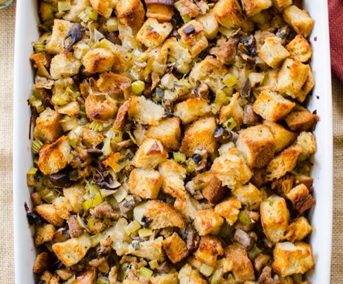 A fun twist on traditional holiday stuffing made with sourdough bread, sausage, leeks and apples, flavoured with fresh sage and rosemary. | livinglou.com