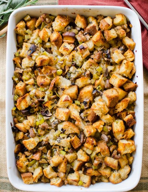 A fun twist on traditional holiday stuffing made with sourdough bread, sausage, leeks and apples, flavoured with fresh sage and rosemary. | livinglou.com