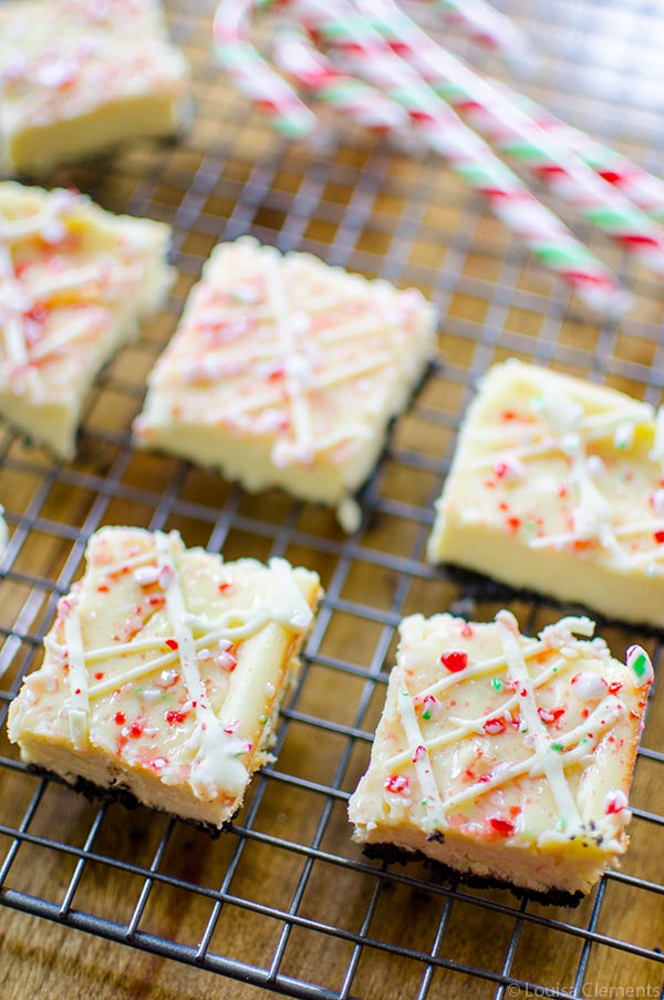 Peppermint cheesecake bars are the ultimate make-ahead potluck dessert. With an oreo base, white chocolate and crushed candy canes. | livinglou.com