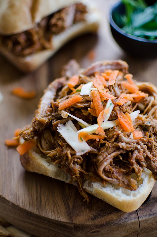 Make a big batch of slow cooker pulled pork with a healthy twist with carrots, pineapple juice and jalapeños. | livinglou.com