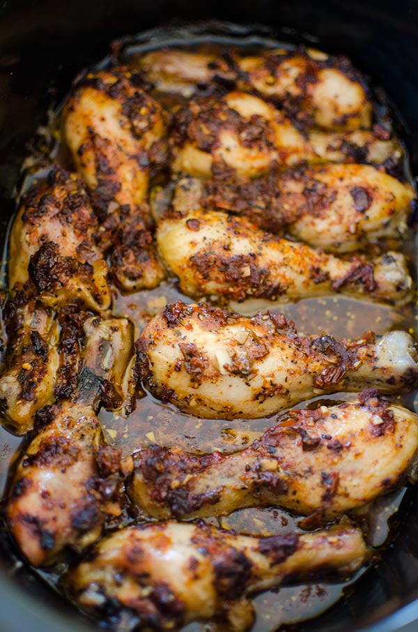 Let your slow cooker do all the work with this flavourful and simple recipe for slow cooker chicken legs with sun-dried tomatoes. | livinglou.com