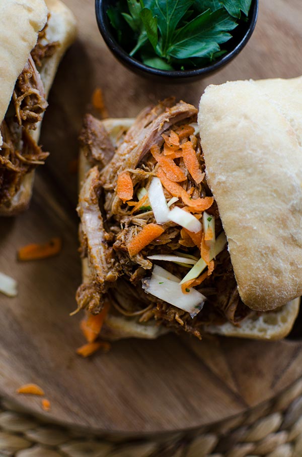 Make a big batch of slow cooker pulled pork with a healthy twist with carrots, pineapple juice and jalapeños. | livinglou.com