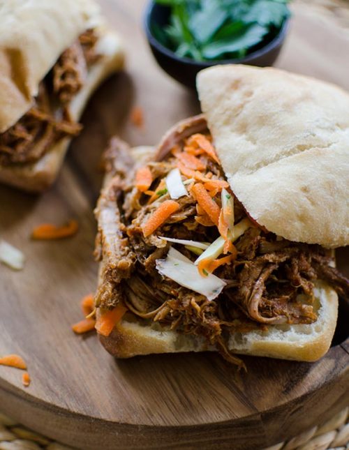 Make a big batch of slow cooker pulled pork with a healthy twist with carrots, pineapple juice and jalapeños. | livinglou.com