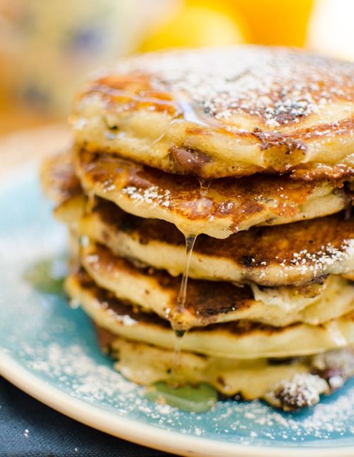 This recipe makes the best chocolate chip pancakes with a combination of milk chocolate, semisweet chocolate and white chocolate chips plus lemon zest. | livinglou.com