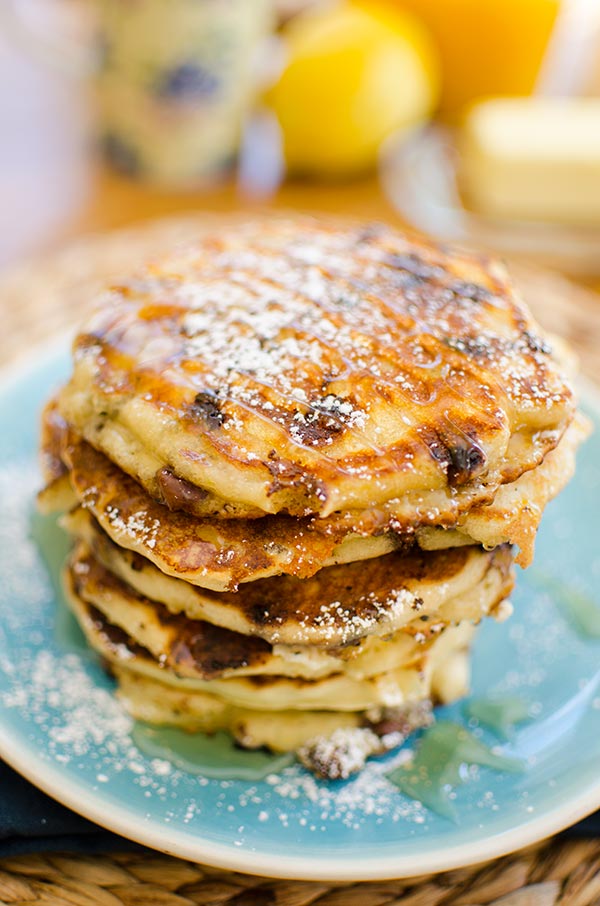 This recipe makes the best chocolate chip pancakes with a combination of milk chocolate, semisweet chocolate and white chocolate chips plus lemon zest. | livinglou.com