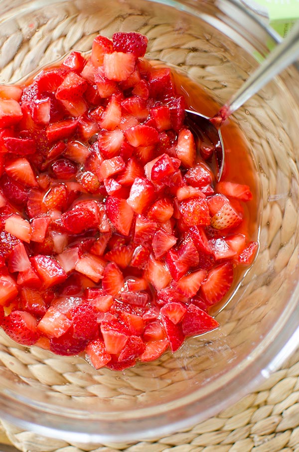 A simple recipe for the ultimate yogurt topping that takes just three ingredients, macerated strawberries. | livinglou.com