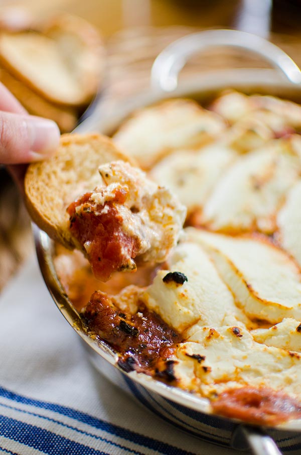 Fire roasted tomato goat cheese dip is a simple and sophisticated appetizer made with a can o fire roasted tomatoes, garlic, herbs and goat cheese. 