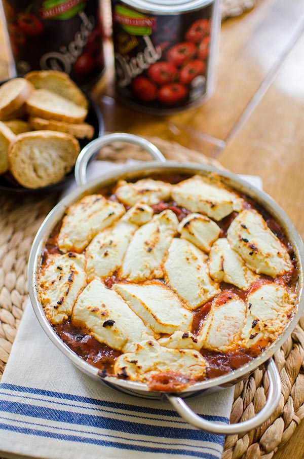 Fire roasted tomato goat cheese dip is a simple and sophisticated appetizer made with a can o fire roasted tomatoes, garlic, herbs and goat cheese. 