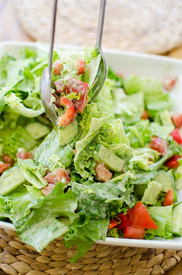 A vegan and creamy herbed tofu salad dressing with parsley, dill and silken tofu. | livinglou.com