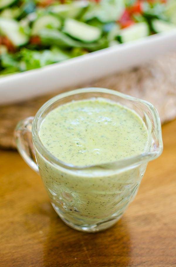 A vegan and creamy herbed tofu salad dressing with parsley, dill and silken tofu. | livinglou.com