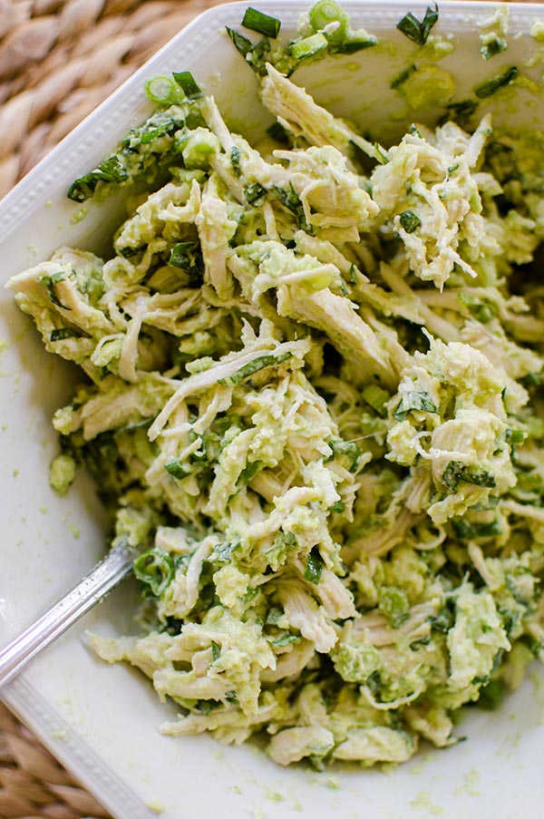 Avocado chicken salad uses avocado instead of mayonnaise for a lighter chicken salad with tons of fresh basil. | livinglou.com