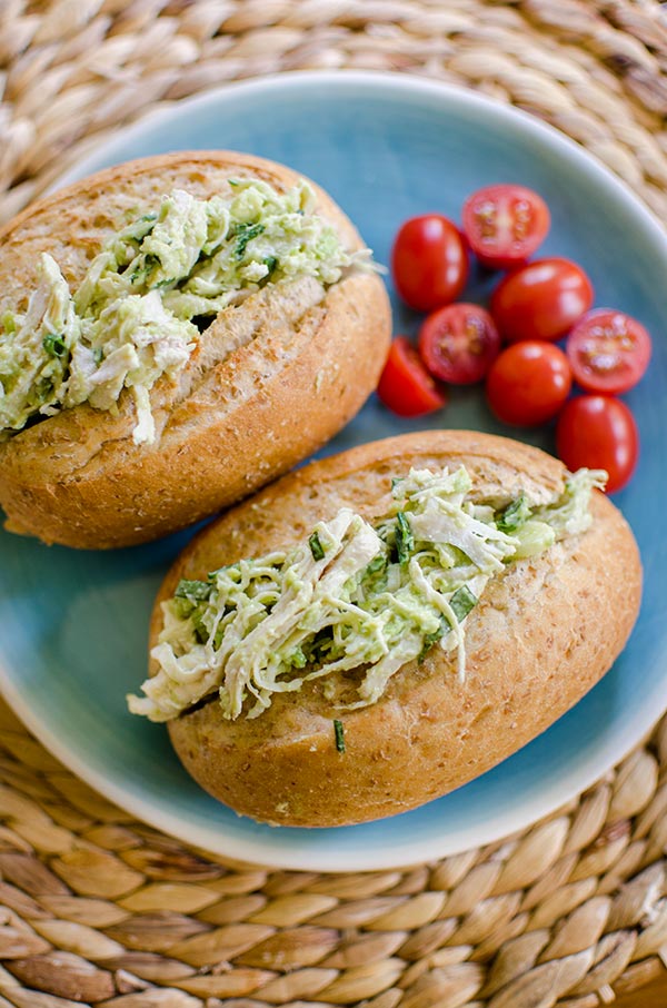 Avocado chicken salad uses avocado instead of mayonnaise for a lighter chicken salad with tons of fresh basil. | livinglou.com