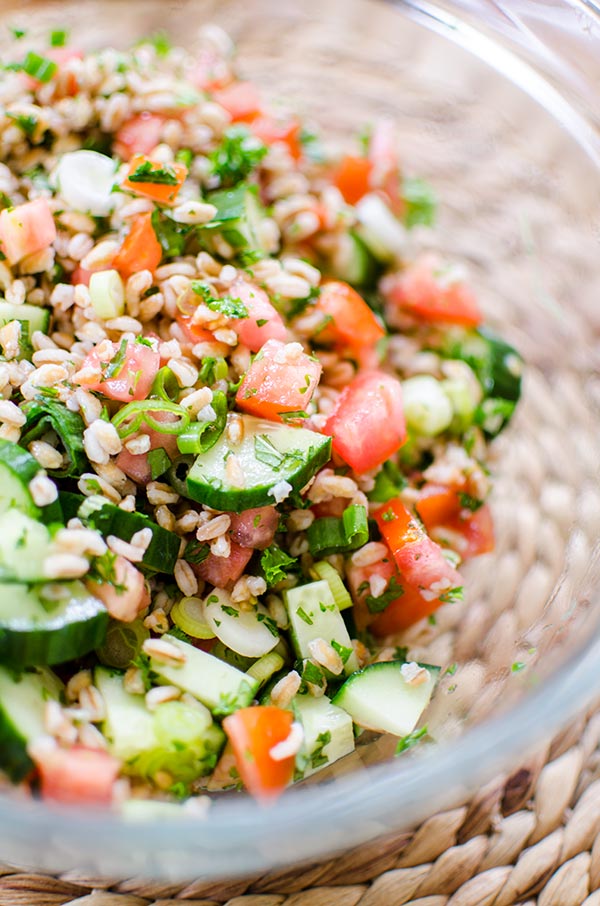 A traditional tabbouleh salad gets an update using farro for a simple and healthy farro tabbouleh salad. | livinglou.com