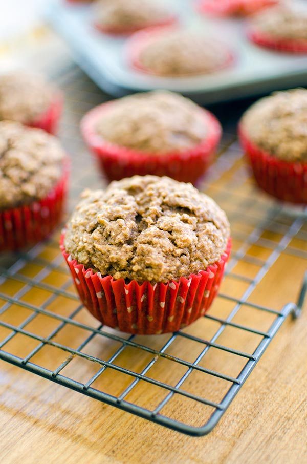 Whole wheat applesauce muffins using unsweetened applesauce for a healthy fall treat! | livinglou.com