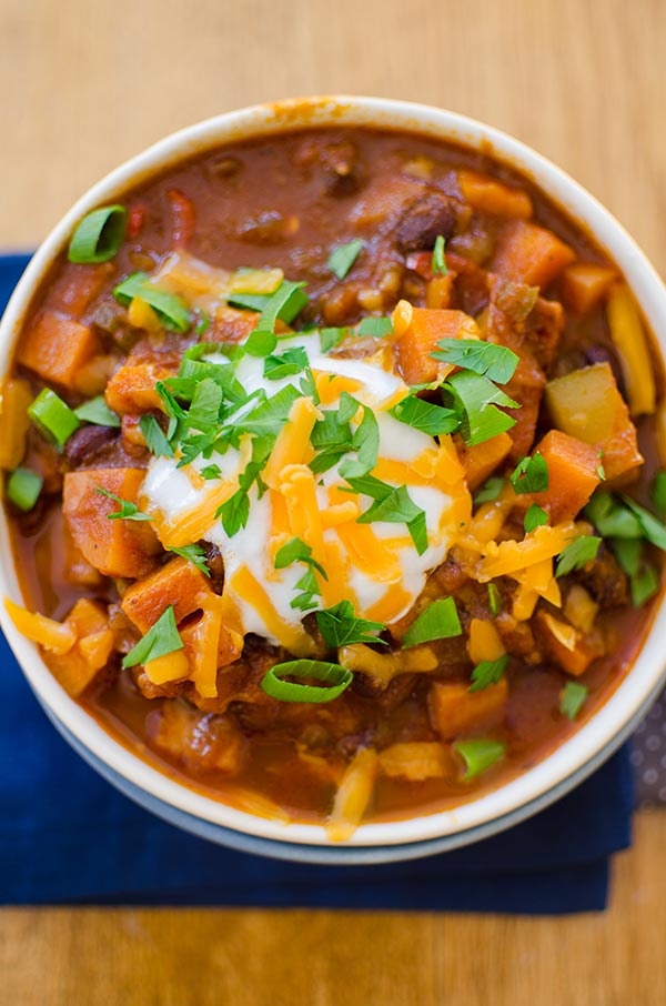 Hearty vegetarian chili with black beans, sweet potatoes, carrots, zucchini and mushrooms. | livinglou.com