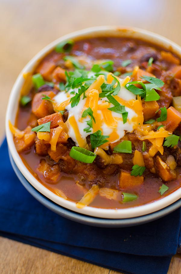 Hearty vegetarian chili with black beans, sweet potatoes, carrots, zucchini and mushrooms. | livinglou.com