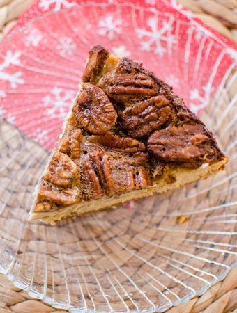 Inspired by a favourite holiday pie, this pecan pie cheesecake has a gooey pecan topping. | livinglou.com