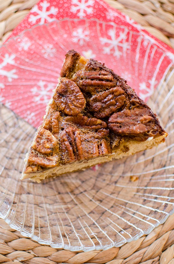 Inspired by a favourite holiday pie, this pecan pie cheesecake has a gooey pecan topping. | livinglou.com